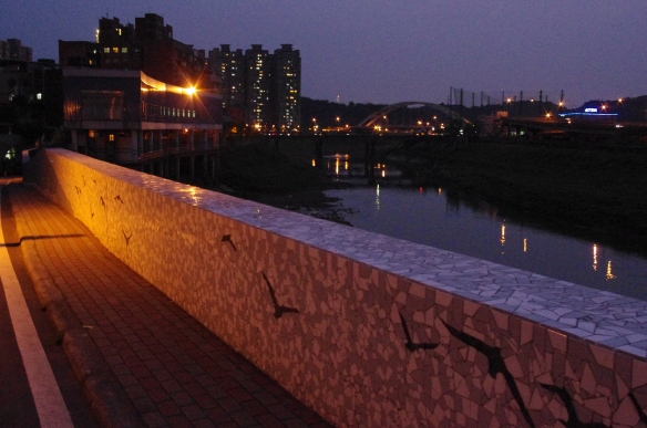 Keelung River and wall with birds mosaic